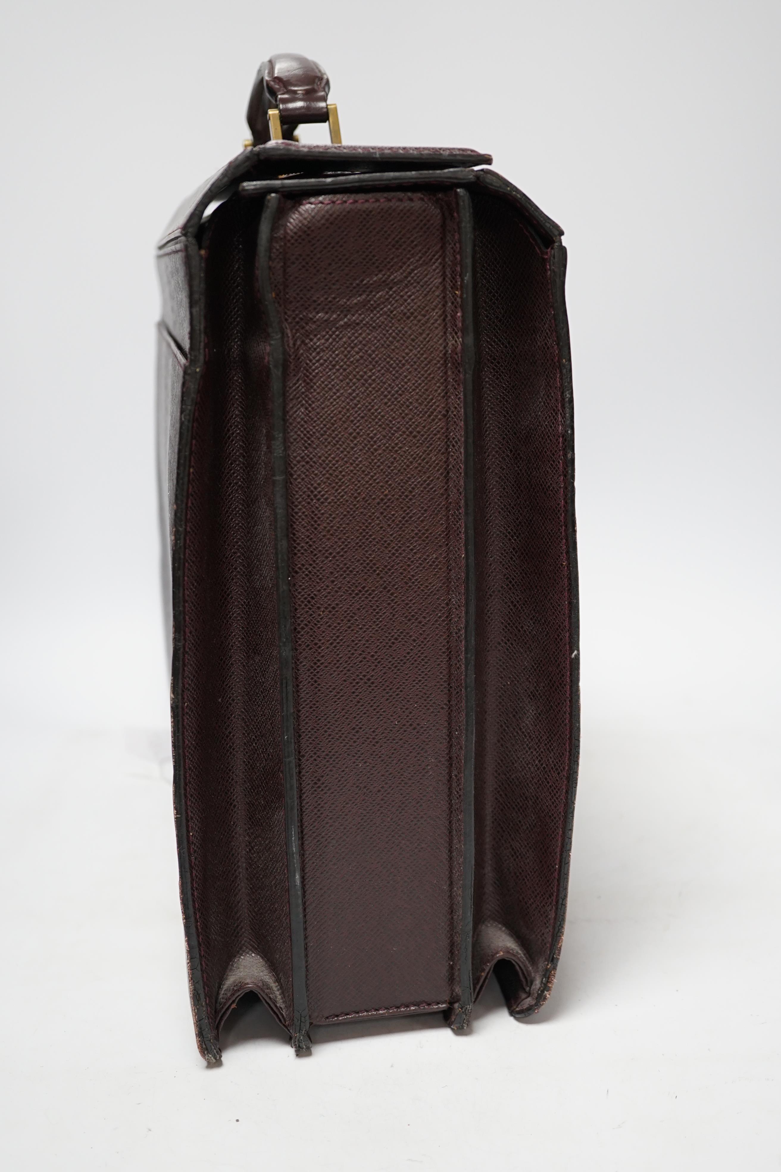 A Louis Vuitton brown leather briefcase, locked and marked, 42cm wide